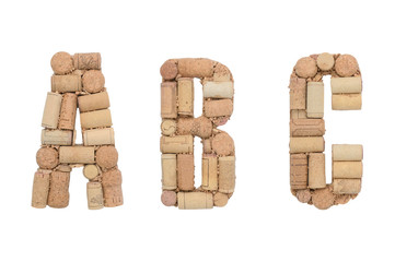 Alphabet letter A, B, C  made of  wine corks isolated on white background. ABC set