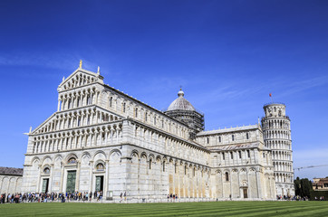 The Pisa Baptistery with the Cathedral and Leaning Tower of Pisa (Tuscany, Italy)