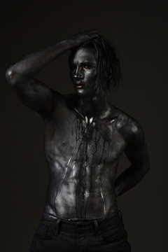 Fashion and masculinity concept. Man with nude torso