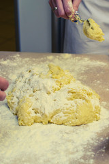 fresh raw dough ball sprinkled with flour