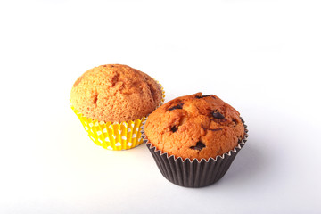 Tasty chocolate cupcakes, muffins on a white wooden table