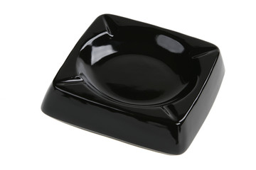 Empty black ceramic ashtray isolated on white