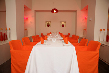 Long table setting in restaurant 