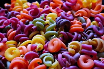 Multicolored pasta. Colored pasta.