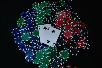 Gambling Concepts. Businessmen are gambling in the casino. Betting is a gamble for investors. Businessmen are playing card games on a black background.