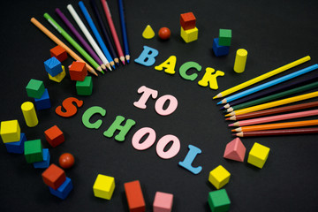 Colorful Back to School text title on black background