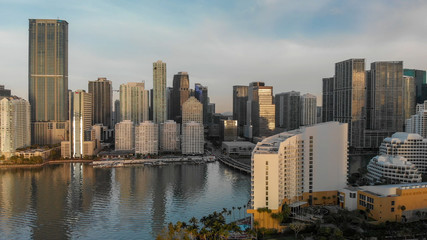 MIAMI - MARCH 31, 2018: Brickell Key and Downtown Miami aerial view. The city attracts 20 million tourists annually
