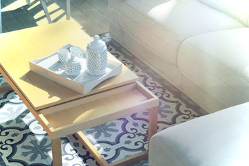 Living room. Interior architecture decoration on a hydraulic tile floor next to the sofa. Empty...