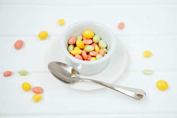 Colorful dragee sprinkles. Peanuts coated with sweet yoghurt.