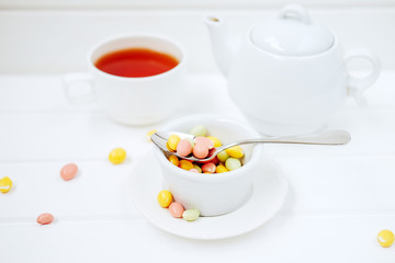 Colorful dragee sprinkles. Peanuts coated with sweet yoghurt.