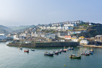 The Cornish village of Mevagissey with a view of the harbour with traditional lobster and crab boats it is a popular destination for tourists and in an area of outstanding natural beauty