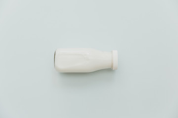 Milk bottle  on pastel background