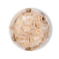 Dry breakfast with milk in plate