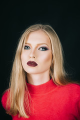 Beauty fashion model woman with bright makeup, perfect fresh pure skin, dark red lips, healthy long blonde hair. Sexy attractive blonde lady with professional makeup. Skincare, haircare concept.