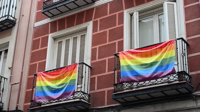 Rainbow flags hanging on balconies