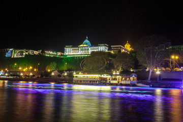 Fototapeta premium Georgia, Tbilisi night . View from the right bank of the Kura River to the Presidential Palace