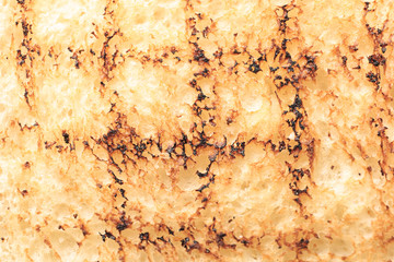 Toasted bread as background, closeup
