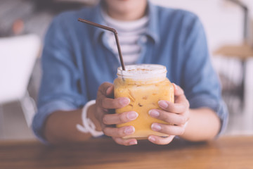 Thai girl drink cold tea