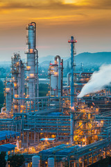 Oil refinery plant with twilight color sky