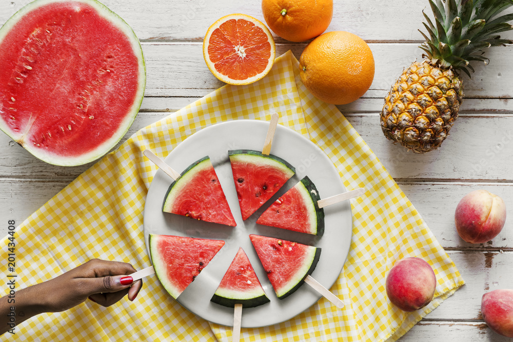 Wall mural freshly slice watermelon on sticks