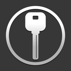 key icon. icon in circle on dark background with simple shadow