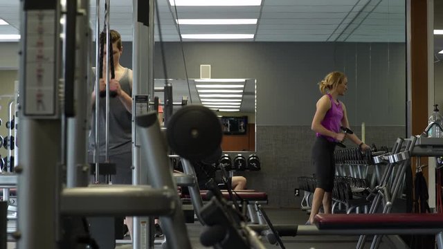 Small group of people working out in a gym