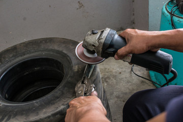 A man working with grinder