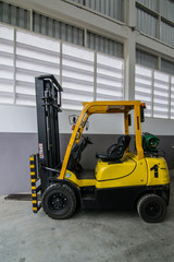 Forklift in warehouse
