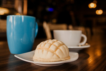concha mexican bread and coffee cup is a breakfast in mexico city 