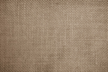 Hessian sackcloth or rustic jute sackcloth woven fabric texture background. Textiles for coffee beans.