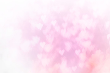 Blurred background of Valentine's day concept. Valentines Day Card. Pastel color tones.multicolored white hearts wallpaper.