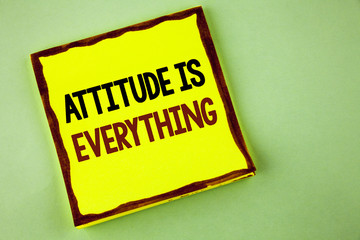 Writing note showing  Attitude Is Everything. Business photo showcasing Motivation Inspiration Optimism important to succeed written on Yellow Sticky note paper on plain background.