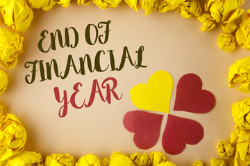 Conceptual hand writing showing End Of Financial Year. Business photo showcasing Taxes time...