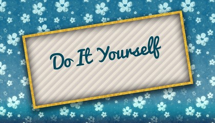 Painting with DO IT YOURSELF message on blue wallpaper with flowers.