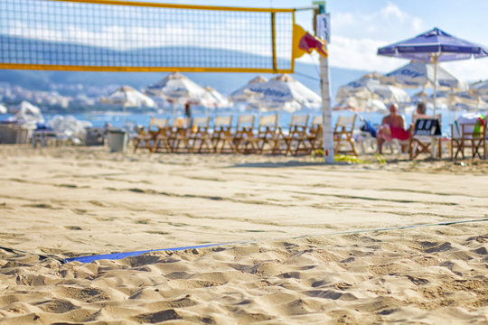 Beach volleyball court in hot summer day ready for game. Selective focus.