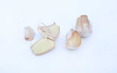 garlic cloves on white background.