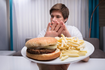 Man Refusing Unhealthy Food