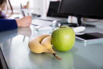 Close-up Of Bananas And Green Apple