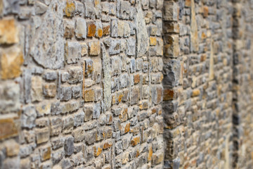 abstraction wall fence built of natural stone background