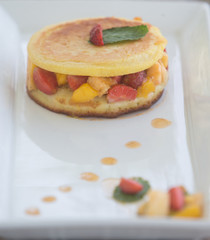 Delicious pancakes close up with fresh fruits healthy breakfast concept