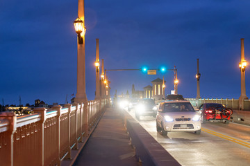 ST AUGUSTINE, APRIL 8, 2018: City night traffic along Bridge of Lions. St Augustine is a famous...