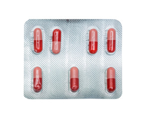 Pack of red pills isolated on white background