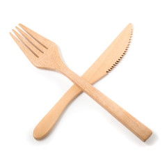 Set of wooden cutlery isolated on a white background