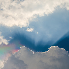 Iridescence, Nice rainbow at clouds with sun ray