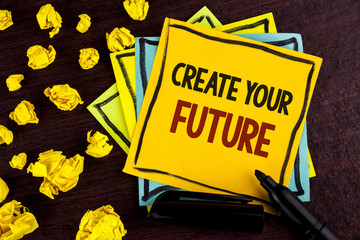 Fototapeta premium Conceptual hand writing showing Create Your Future. Business photo showcasing career goals Targets improvement set plans learning written on Sticky Note Paper on wooden background Paper Balls