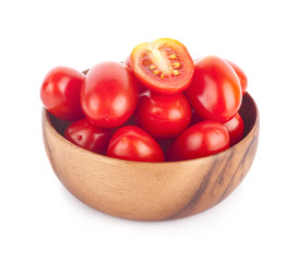 tomatoes in wooden bowlin wooden bowl