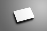 Realistic  mockup of a pile of blank bank (gift) cards isolated on a gray background.