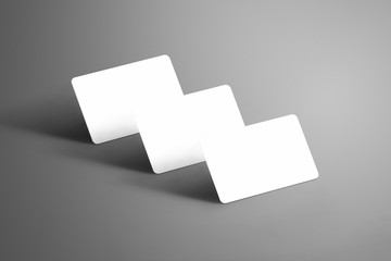 Universal template of a three white  bank (gift) card isolated on a background.