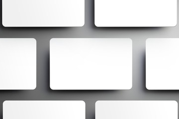 Top of view mockup of a few gift (bank) card isolated on a gray background.