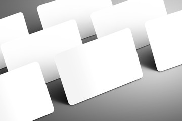 Business mockup of a few blank gift (bank) card isolated on a gray background.
